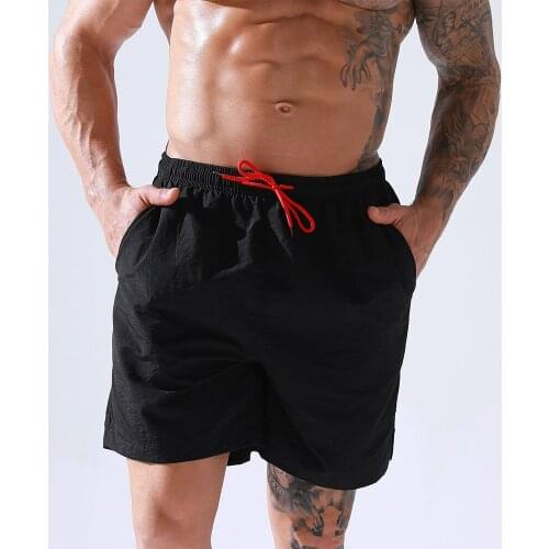Mens Summer Board Shorts Solid Swimsuit Men Swimwear Casual Gay Swimwear Men Surffing Beachwear Shorts With Pocket Swim Briefs