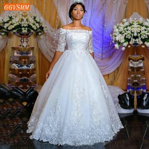 Gorgeous Africa Boat Neck White Wedding Gowns Off Shoulder Half Sleeve Ball Gown Bridal Dresses Long Lace Applique Wedding Dress