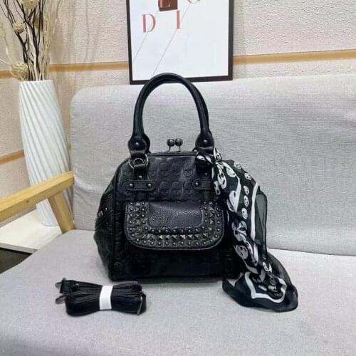 European and American fashion leisure ladies real leather bag handbag personality rivet one shoulder cross-body bag makeup bag