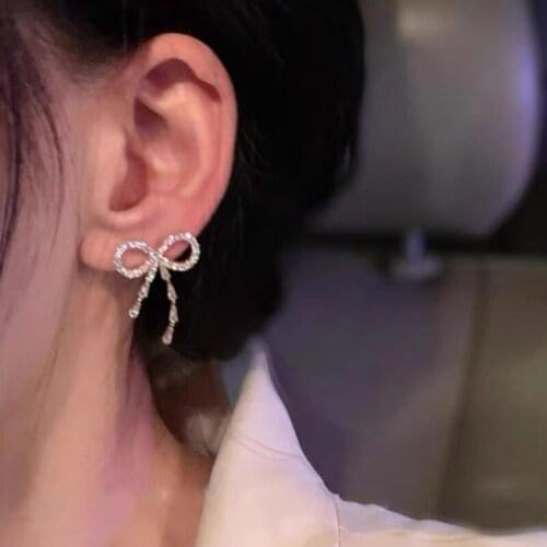 U-Magical Exquisite Hollow Out Bow-knot Dangle Earring for Women Bling Bling Rhinestone Gold Metallic Earring Jewelry Pendientes