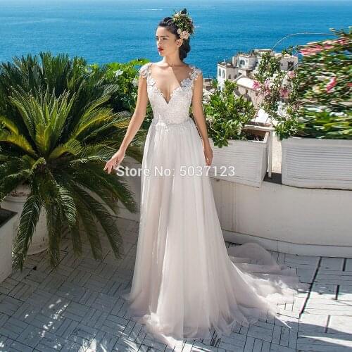Beach Wedding Dresses Deep V Neck Cap Sleeves Lace Appliques Bridal Wedding Gowns Button Illusion Court Train Vestido De Noiva