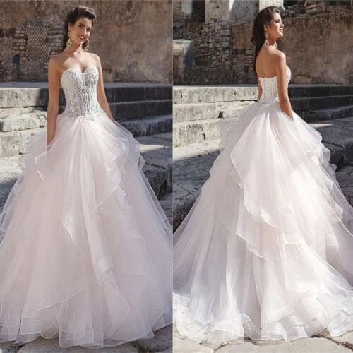 Luxury Sweetheart Ball Gown Wedding Dresses 2021 Lace Applique Puffy Princess Sleeveless Bridal Gowns Custom Made Robe De Mariee