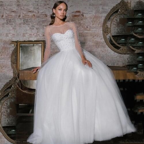 New Arrival Scoop Long Sleeve See Through Top Pearls Sashes Buttons Tulle Wedding Dress 2021 Vestido De Noiva Bridal Gown