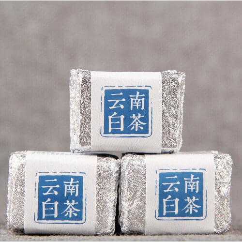 2020 Yunnan Mini Compressed Tea Sun dried Nectar Fragrance White Chinese Tea 100g
