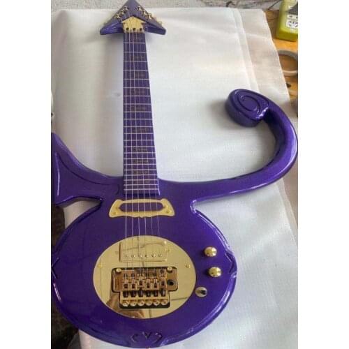 High quality Prince sword electric guitar, one arrow through the heart, gold parts, free transportation