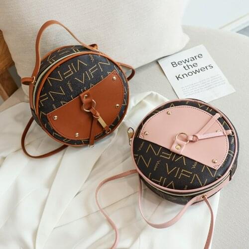 2021 forever young Korean style womens mobile phone small round bag creative rivet trendy fashion Joker shoulder crossbody bag