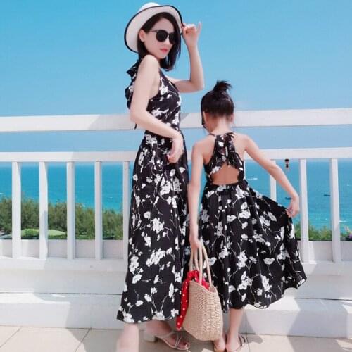 Mother and Daughter Dress Seaside Holiday Floral Dress Parent-child Dress Summer Dress 2021 New Bohemian Halter Backless Dress