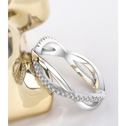 Designer original new silver inlaid crystal cross-wrapped ring exquisite and elegant charm ladies cocktail party accessories