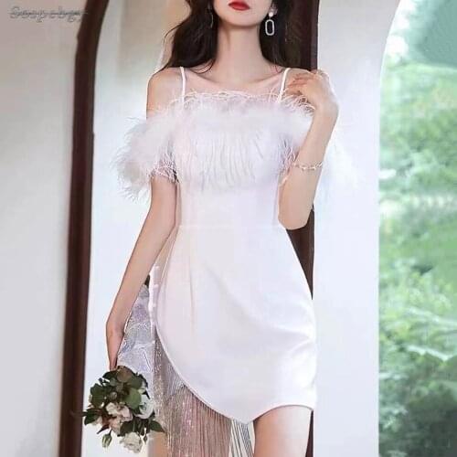 Womens Fashion Sexy Strapless Tight Dress Feather Crystal Tassel Decoration Black and White Sleeveless Mini Club Party Dress
