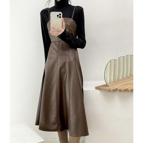Leather dress 2021 spring autumn retro French niche external wear pu leather sling dress mid-length waist slimming dress women