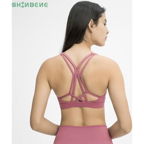 SHINBENE Beautiful Strappy Workout Sports Bras Tops Women Naked-feel Wireless Yoga Fitness Bras Padded Push Up Athletic Tops