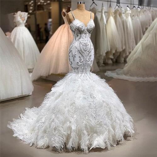 Luxury Mermaid Wedding Dresses Crystals Beads Feather Bridal Gowns Vestido De Noiva Spaghetti Straps Bride Robe de mariée