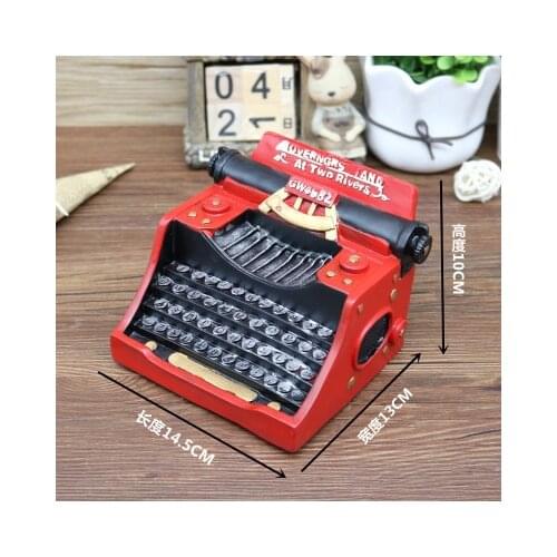 Model of European retro-resin typewriter is arranged with creative art storage tank room window props home Crafts Arts