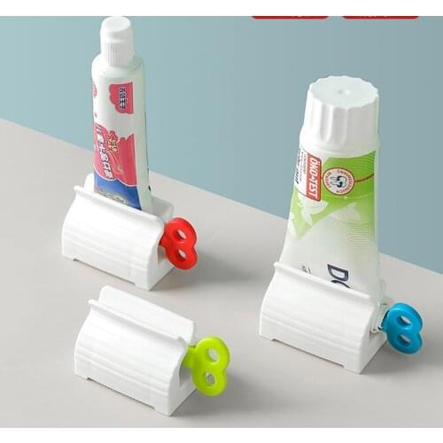 New Bathroom Accessories Toothpaste Squeezer Tooth Paste Dispenser Tube Squeezer Facial Cleanser Press Rolling Holder for Kids
