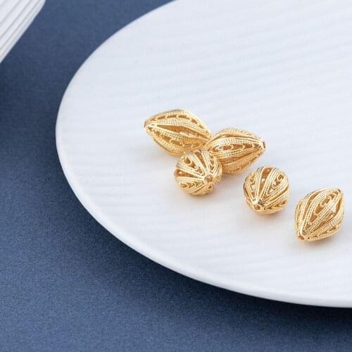 K color Gold color filled Openwork olive pattern carved spacer Beads for making jewelry accessories 12*18mm 5pcs