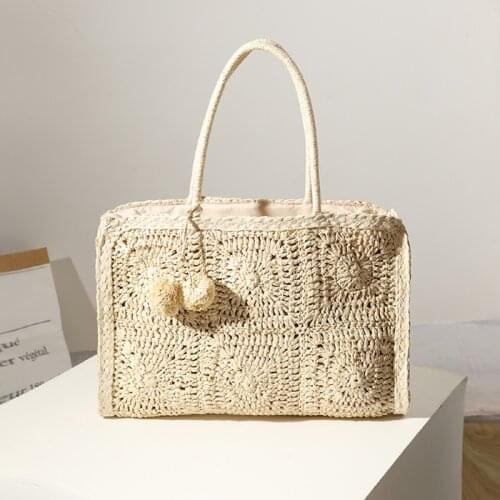 2021 new hollow straw woven bag fashionable large-capacity hair ball hand-woven bag casual one-shoulder portable female bag