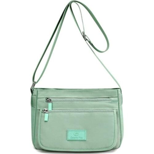 2021 new Korean fashion commuter shoulder bag, solid color lightweight and large capacity travel bag storage handbag