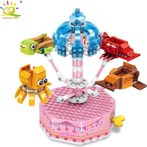 HUIQIBAO Lovely Girl Casle Rotating Ship Music Box Building Blocks Amusement Park Creative Bricks Children Toys Home Decoration