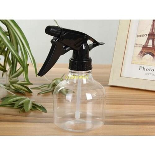 Free shipping Hand-pressed small transparent sprinkling kettle for flower sprinkling garden holding sprayer