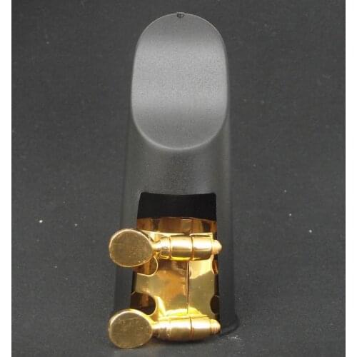 Alto Eb sax ligature and cap