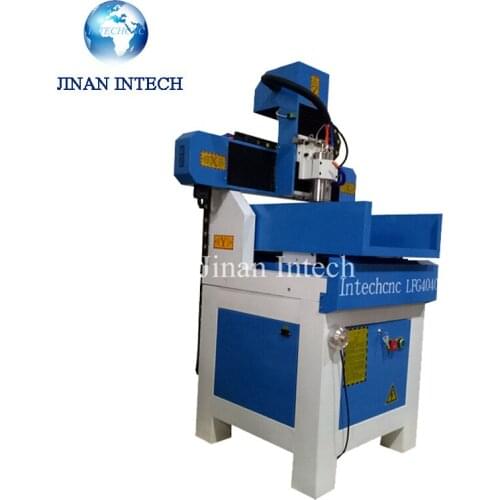 Cost effective table moving 4040 shoe mould making cnc machine/multi head 4 axis cnc machine