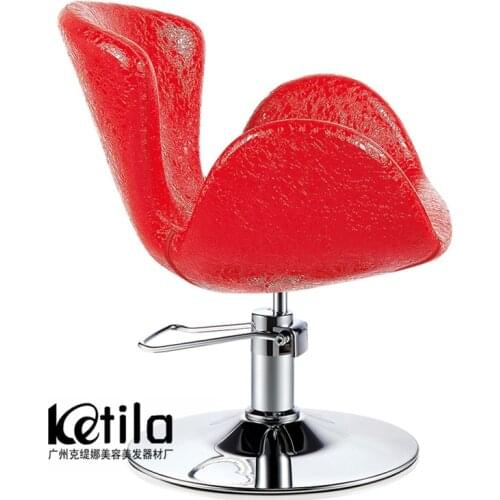 Fashion hairdressing chair. Hair salon chair. Swivel chair