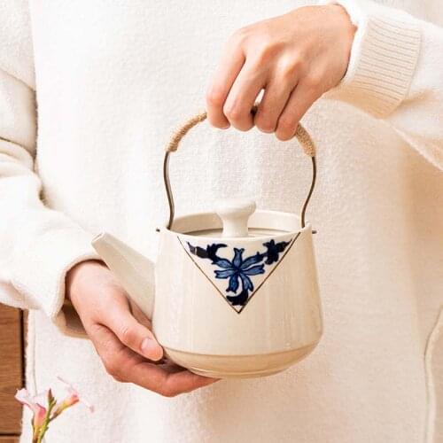 Japanese hand-painted Kung Fu teapot ceramic household tea set tea maker tea cup single pot creative iron handle portable pot