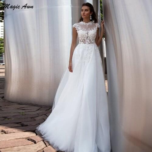 Magic Awn 2021 Princess Wedding Dresses Illusion Lace Appliques O-Neck Boho A-Line Wedding Party Gowns Beach Abito Da Sposa