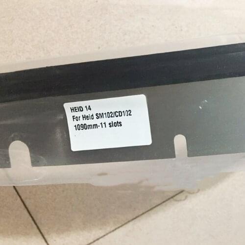 41.010.180 SM102 CD102 4 units wash up blade 1090mm 11 holes and 1 unit 66.849.019 sheet guide plate