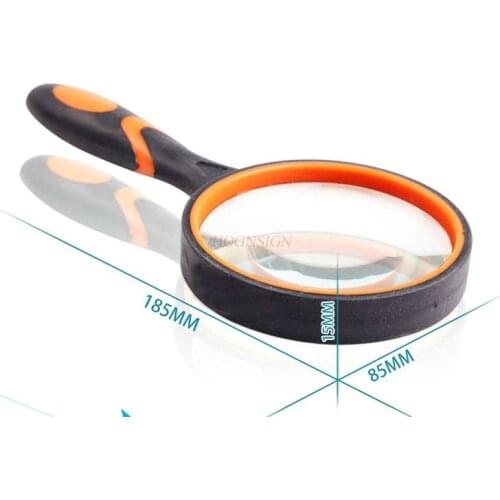 Magnifying equipment Elderly man holding a handle magnifying glass reading 10 times student reading book reading newspaper