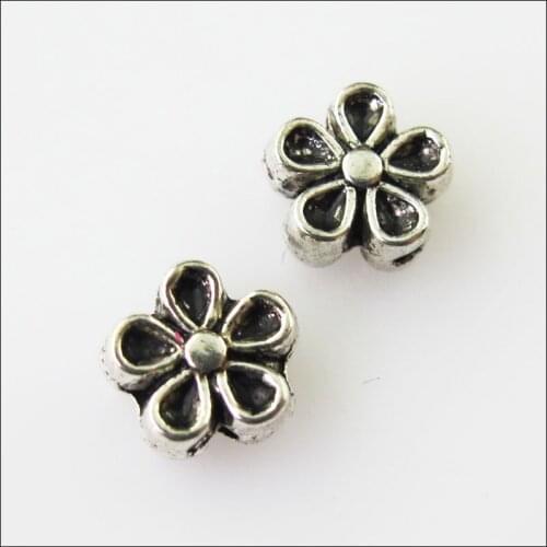 50 New Tiny Flower Star Charms Tibetan Silver Tone Spacer Beads 7mm