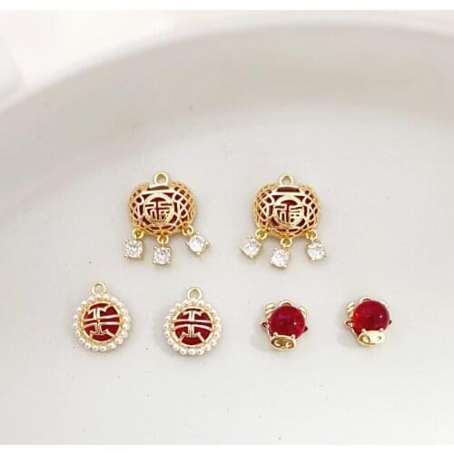 Gold-clad Chinese style red blessing zodiac ox head double lucky pendant DIY jewelry material
