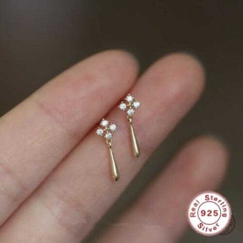 CCFJOYAS 925 Sterling Silver White Zircon Snowflake Stud Earrings for Women Simple Water Drop 14K Gold Plated Earring Jewelry