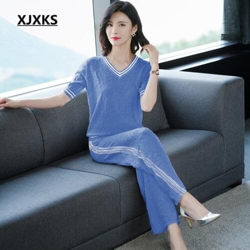 XJXKS Fashion V-neck short-sleeved top + elastic waist nine-point pants 2020 summer new women two-piece set