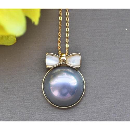 Z11110 Lustre 16mm Blue Shell Mabe Pearl Bowknot Chain Pendant CZ