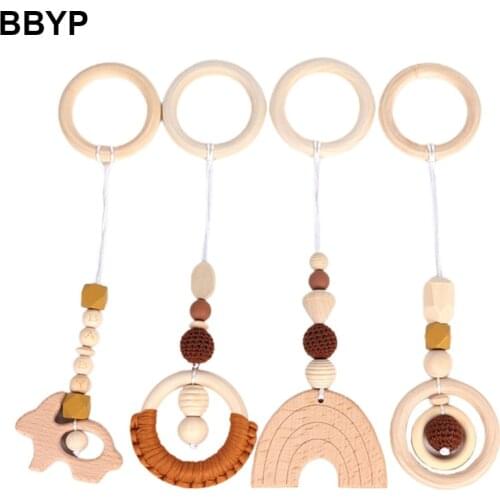 4 Pcs/Set Baby Teething Nursing Rattle Toys Gifts Play Gym Frame Stroller Hanging Pendants Wooden Ring Teether Molar