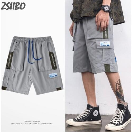 Mens shorts Loose Harajuku New Pocket tooling stitching embroidery Trend Hip Hop loose sports five points Pants Male Streetwear