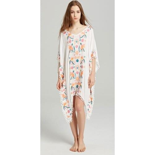 Summer new travel Bohemian island holiday embroidery flower bird ball tassel blouse loose large size v-neck irregular dress