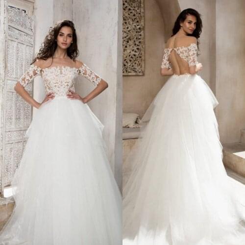 2020 Wedding Dresses Jewel Half Sleeves Lace Appliques Beach Bridal Gowns Hollow Back Sweep Train A Line Wedding Dress