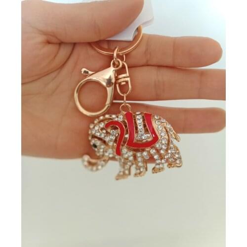 Fil detaylı Şık metal anahtarlık Göz alıcı anahtarlık Çanta aksesuarı Cüzdan süsü Zarif ve Şık