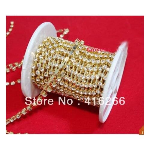 Free shipping!Gold chain Rhinestone cup chain ,ss12 Crystal stone,10yards/roll, garment accessories,Tube packaging