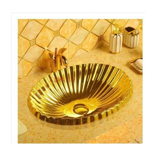 Gold plating on the wash basin under the table wash basin oval embedded wash basin gold basin