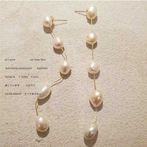 Korean version of retro natural pearl tassel earrings long pearl elegant fairy pearl silver needle earrings female jewelry