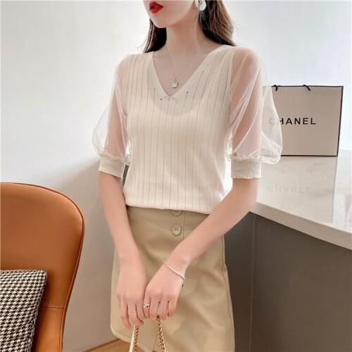 To film in v-neck sweater coat render unlined upper garment of sexy female low collar T-shirt