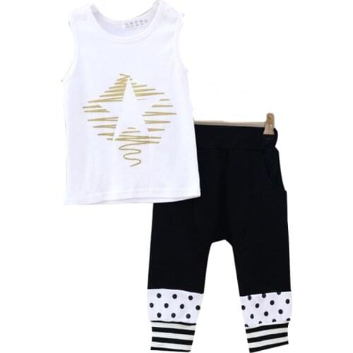 Children Wit Sets Of Clothes For Boys