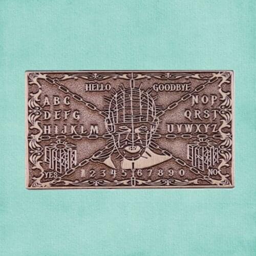 Pinhead Puzzle Box Lament Configuration Ouija Planchette talking board lapel pin Fortune Telling Clive Barker horror film brooch