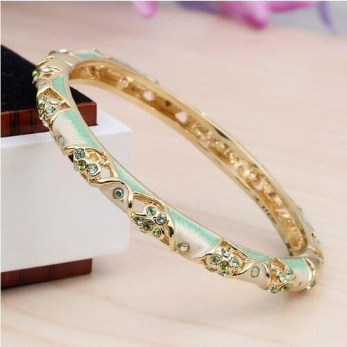 Bracelet female fashion restoring ancient ways is hollow-out the enamel gold-plated bracelet girlfriend jewelry gift