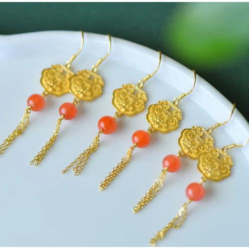 Ancient gold craftsmanship inlaid natural Hetian jade lion head tassel earrings exquisite and elegant ladies silver jewelry