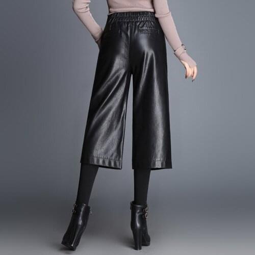 2017 new PU leather pants female Korean version of the loose high waist false two pieces of cashmere nine points wide leg pants