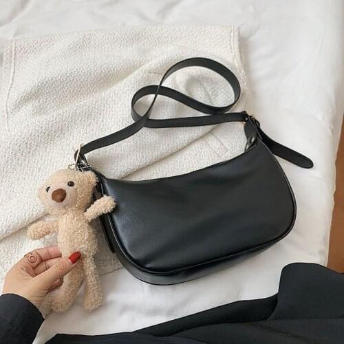Pure color leather messenger bag ladies zipper bag casual shoulder bag dumpling bag cartoon ornaments female bag wallet